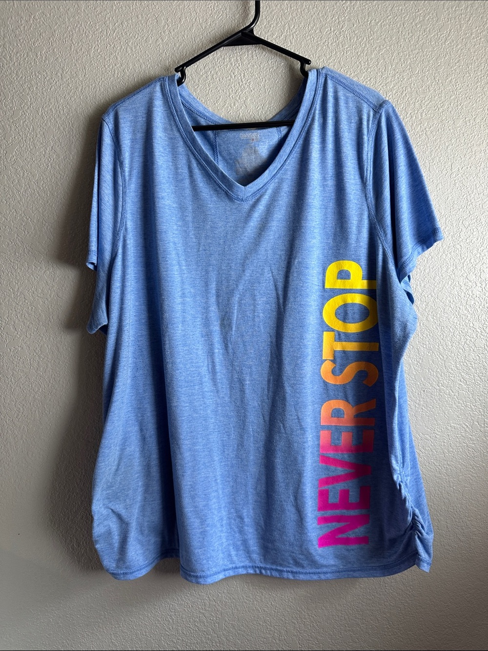 Danskin Light Blue V-Neck Tee with Yellow-Pink Gradient 'NEVER STOP' Print